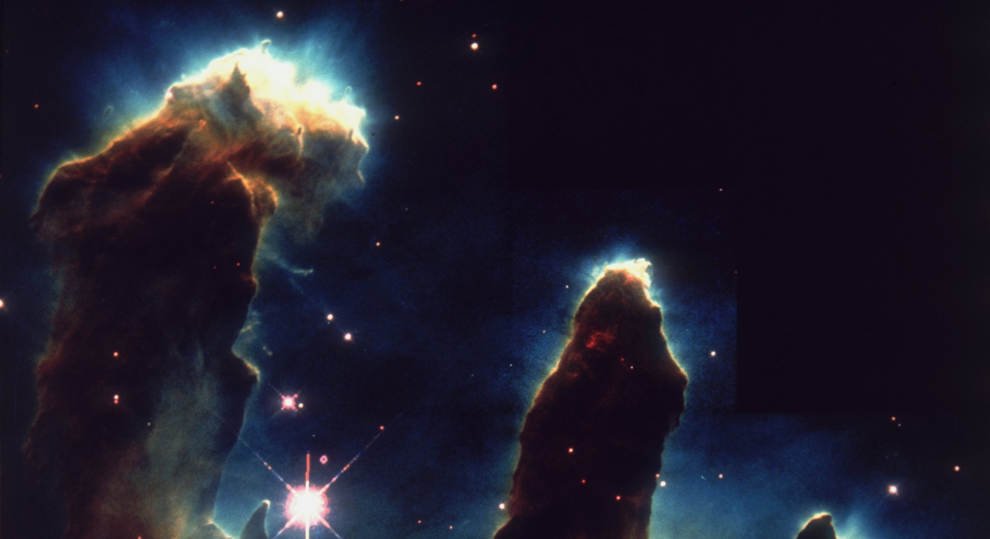 1st April 1995: An image taken via Hubble telescope entitled Pillars of Creation, depicting gaseous ...