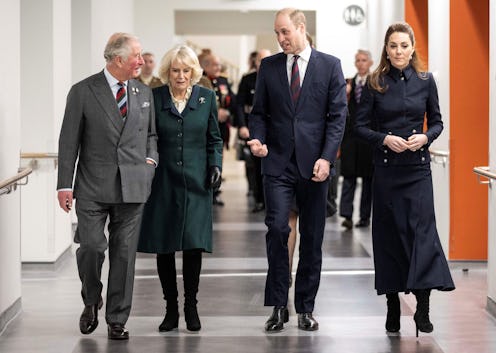 Britain's Prince William, Duke of Cambridge (2R) and his wife Britain's Catherine, Duchess of Cambri...