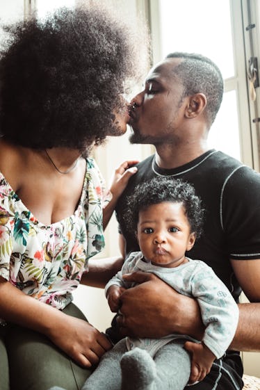 happiness african family at home doing a portrait