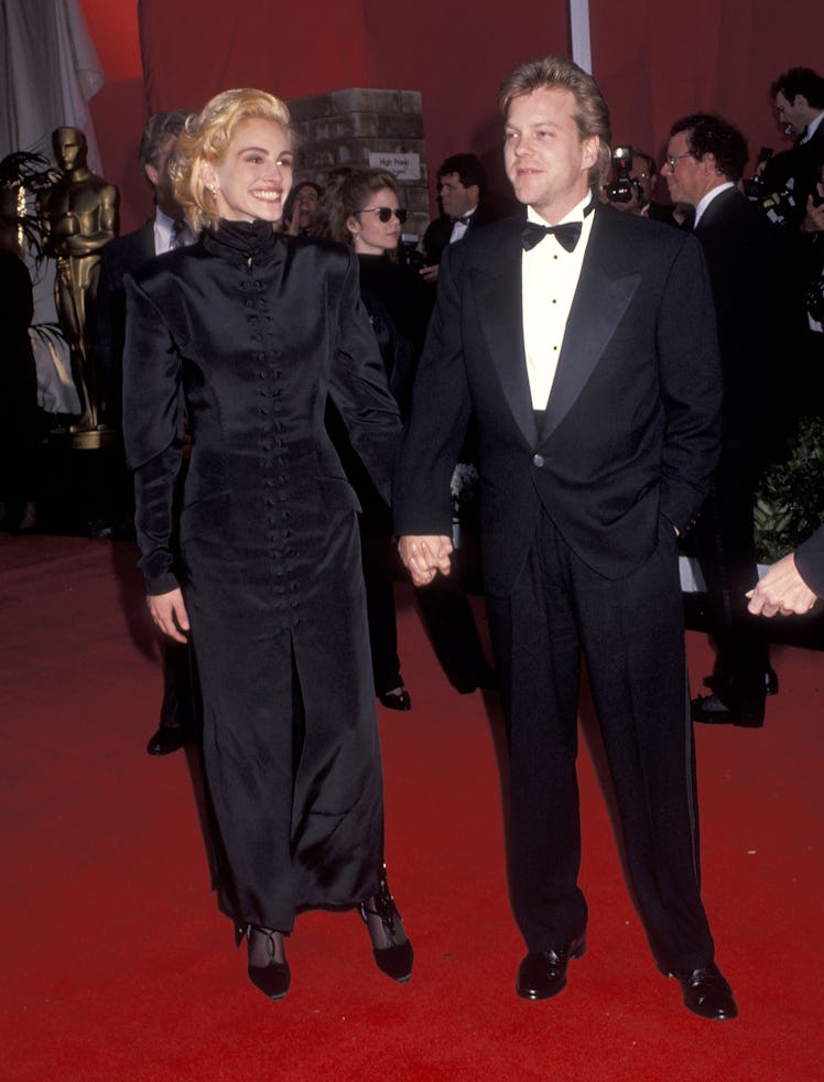 Actress Julia Roberts and actor Kiefer Sutherland attend the 63rd Annual Academy Awards 