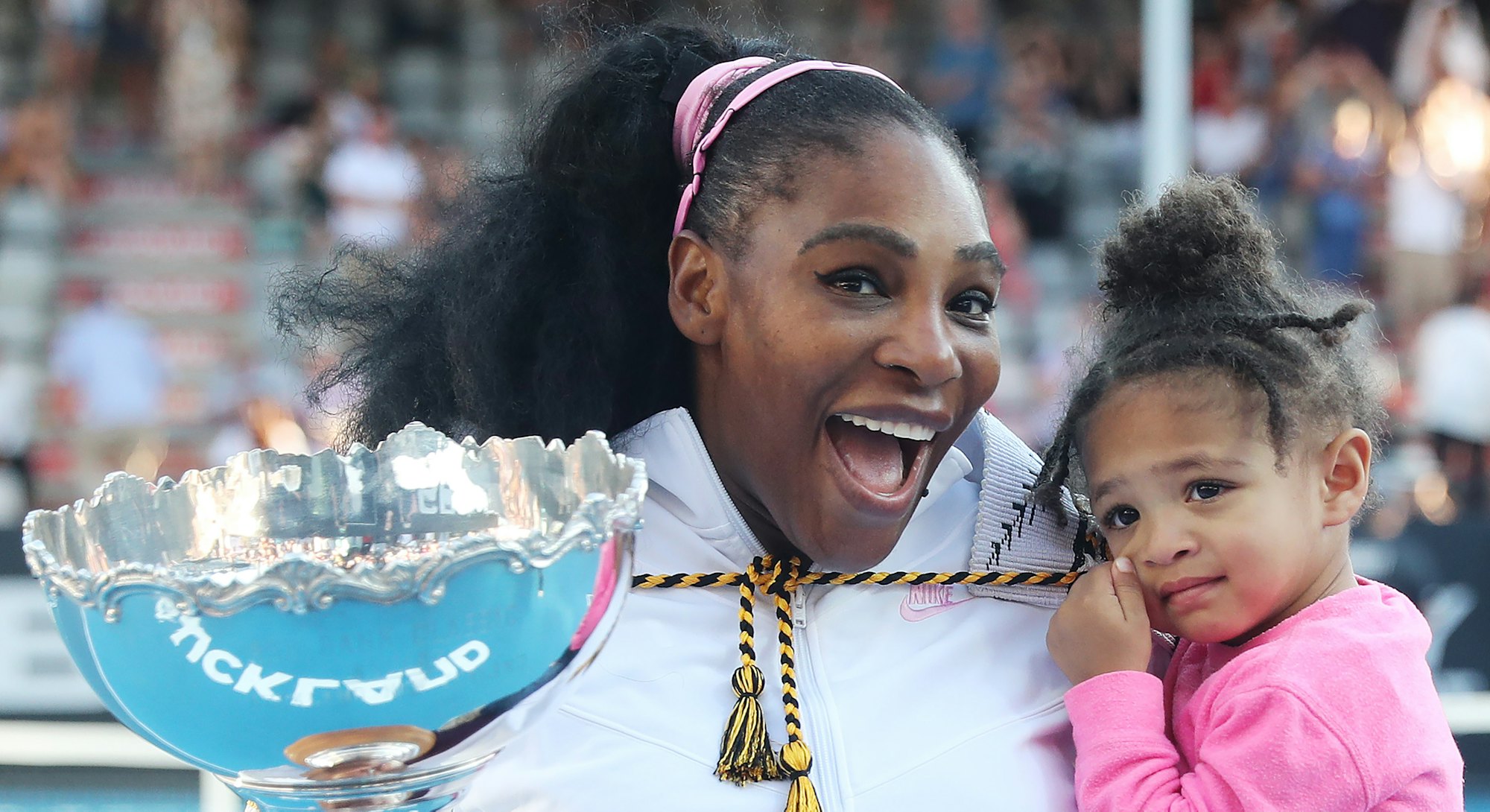 TOPSHOT - Serena Williams of the US with her daughter Alexis Olympia after her win against Jessica P...