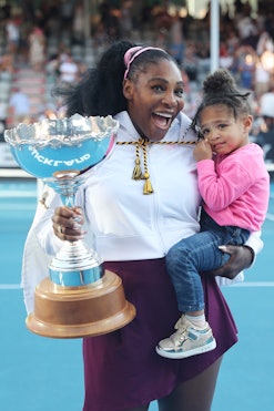 TOPSHOT - Serena Williams of the US with her daughter Alexis Olympia after her win against Jessica P...
