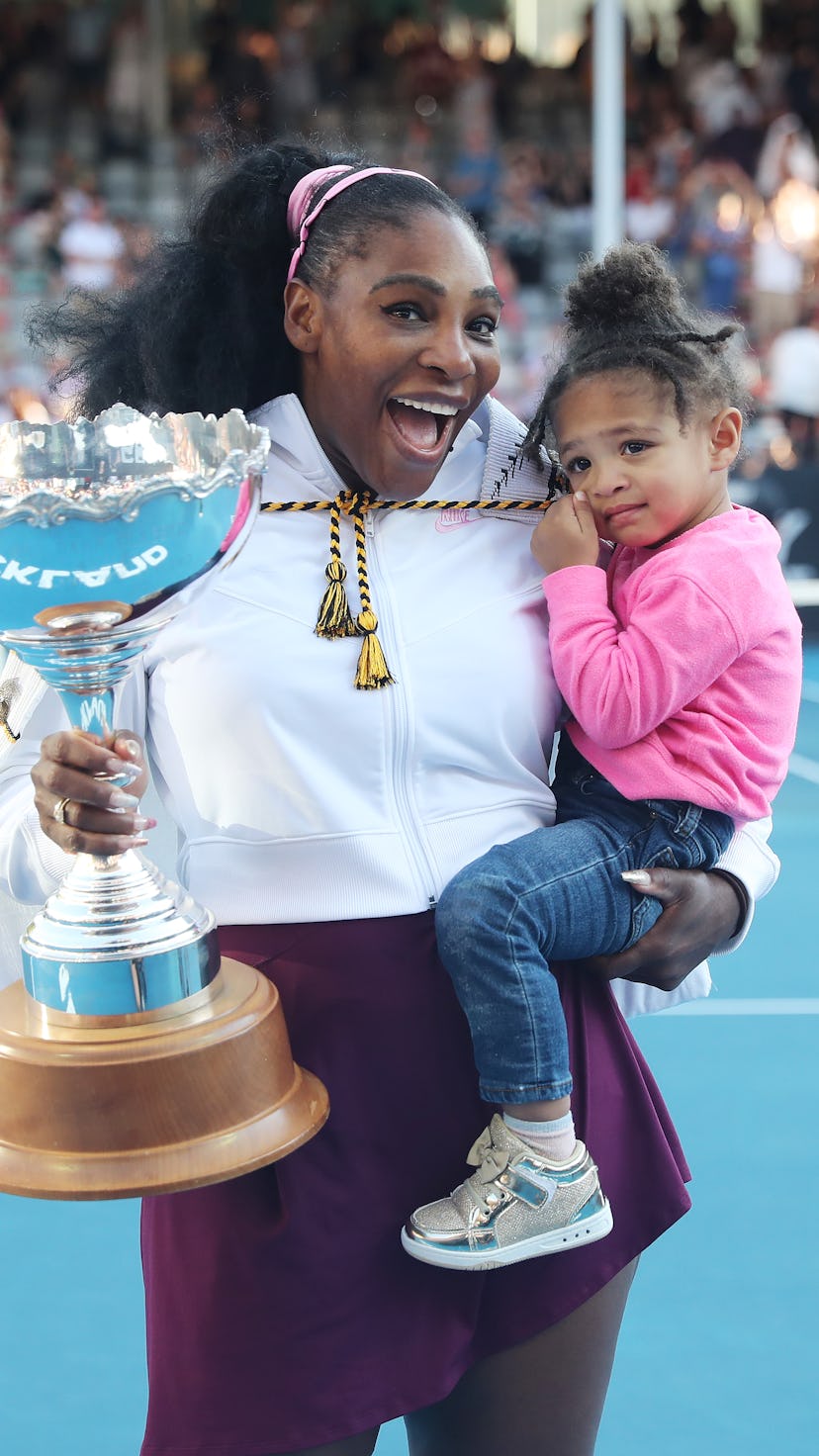 TOPSHOT - Serena Williams of the US with her daughter Alexis Olympia after her win against Jessica P...