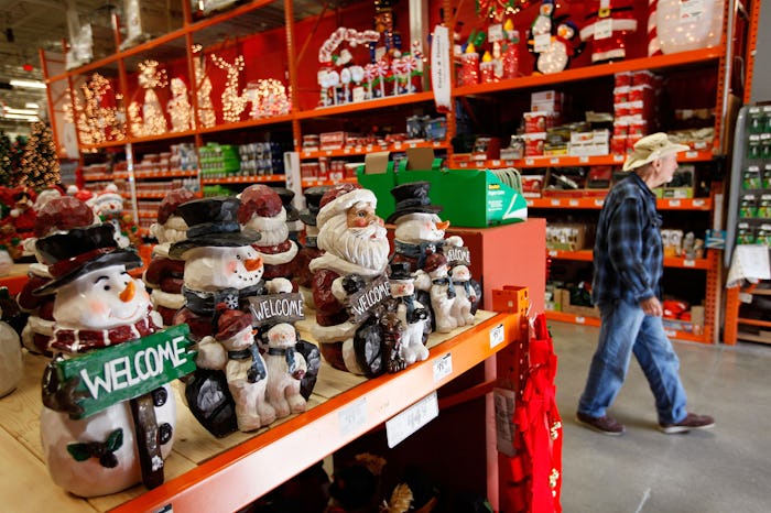 NILES, IL - OCTOBER 05: A man walks by Christmas merchandise offered for sale at a Home Depot store...