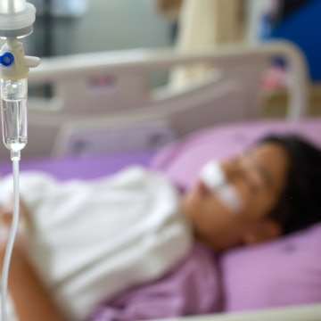 A child in a hospital bed. The CDC is warning parents about AFM, a virus that can lead to paralysis.