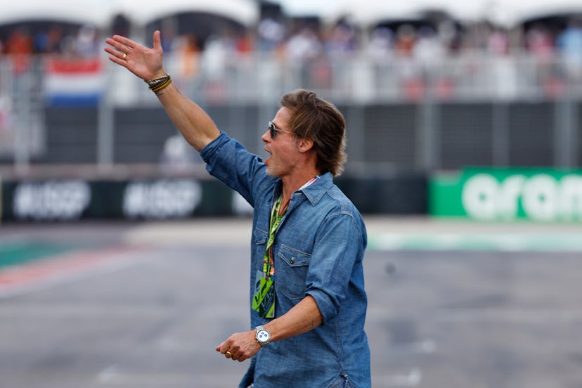 AUSTIN, TEXAS - OCTOBER 23: Brad Pitt waves to the crowd from the grid during the F1 Grand Prix of U...