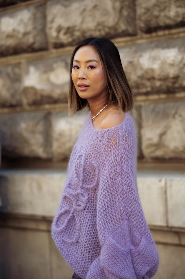 Aimee Song shares details about postpartum depression and anxiety. Here, she is wearing dark purple ...