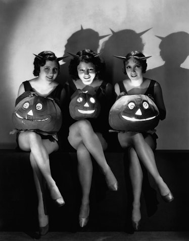Hollywood starlets Lillian Roth Marion Shilling and Rosita Moreno pose with Halloween pumpkins for p...