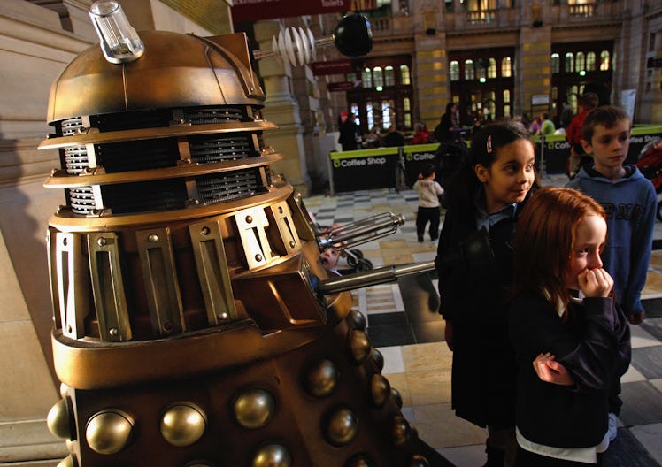 GLASGOW, UNITED KINGDOM - NOVEMBER 17: Two girls view a Dalek as Doctor Who exhibition tickets go o...