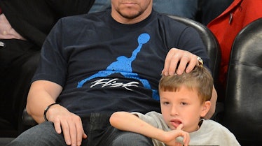 Actor Mark Wahlberg attends an NBA game between the Denver Nuggets and the Los Angeles Lakers with h...