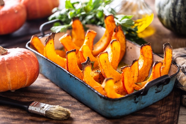 Roasted pumpkin hokkaido in olive oil salt pepper and celery herbs. in an article about how to dispo...