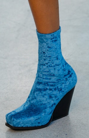 Blue velvet wedge boots at the Stella McCartney Fall/Winter 2022 runway show.