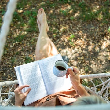 A woman enjoying coffee in her garden. A recent tweet about relaxing in the morning had people ragin...