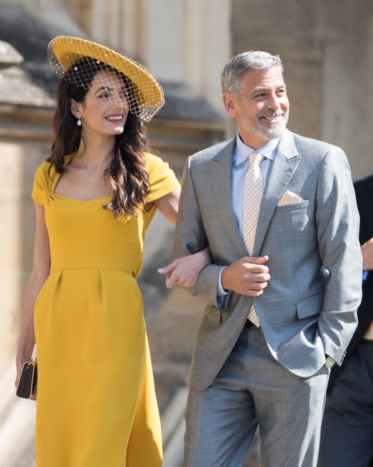 WINDSOR, ENGLAND - MAY 19:  George Clooney and Amal Clooney attend the wedding of Prince Harry to Ms...