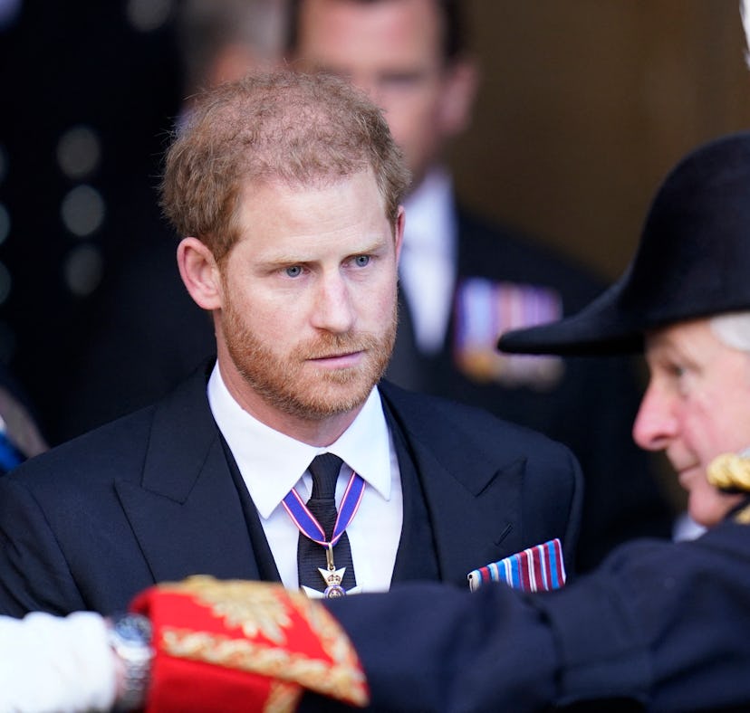 Britain's Prince Harry, Duke of Sussex, leaves after paying his respects at Westminster Hall, at the...
