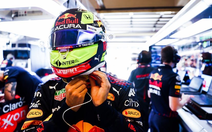 AUSTIN, TEXAS - OCTOBER 23: Sergio Perez of Mexico and Red Bull Racing prepares to drive in the gara...