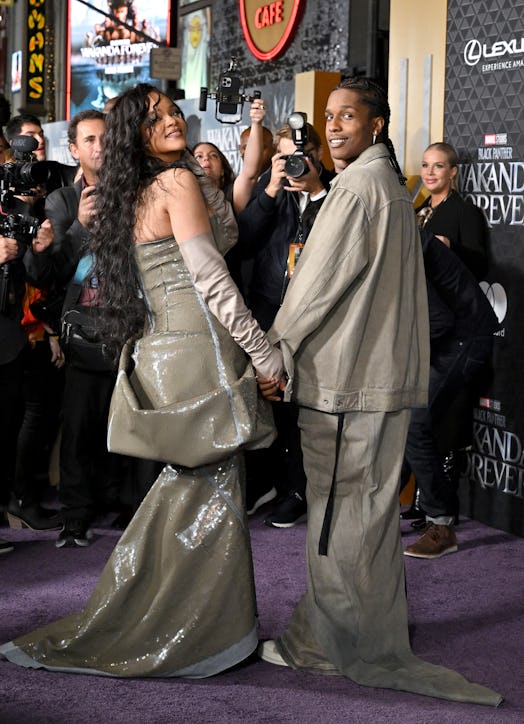  Rihanna and A$AP Rocky wear matching outfits and attend Marvel Studios' "Black Panther 2: Wakanda F...