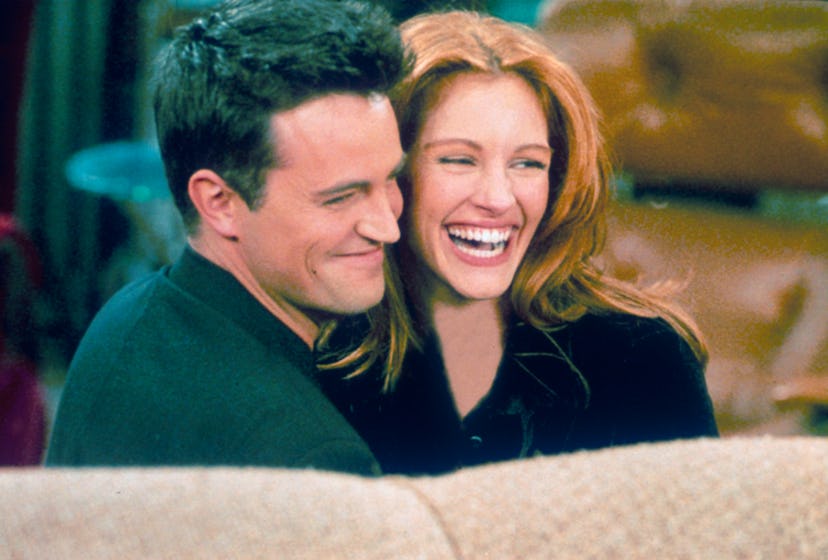 304422 21: Actor Matthew Perry and actress Julia Roberts hug each other on the set of "Friends." (Ph...