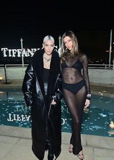 LOS ANGELES, CALIFORNIA - OCTOBER 26: (L-R) Kim Kardashian and Hailey Bieber attend as Tiffany & Co....