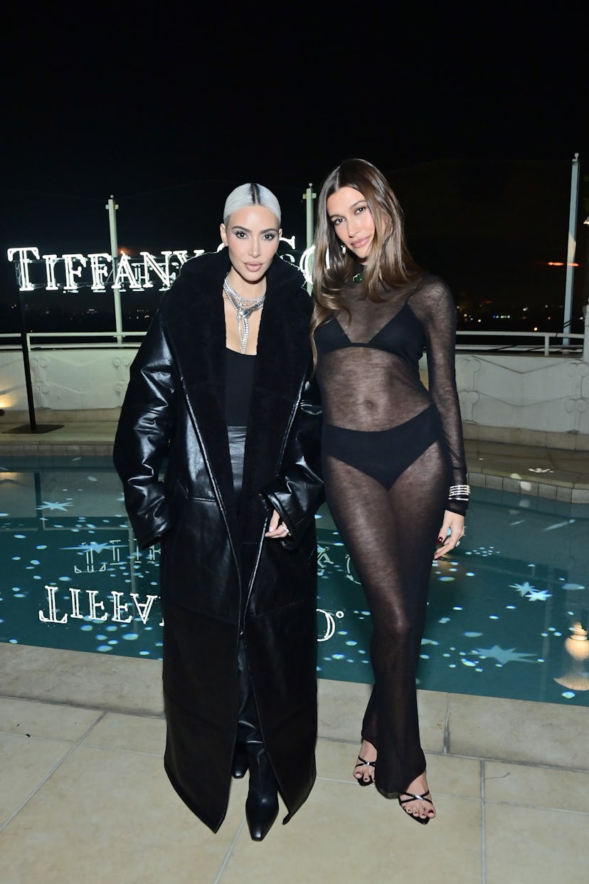 LOS ANGELES, CALIFORNIA - OCTOBER 26: (L-R) Kim Kardashian and Hailey Bieber attend as Tiffany & Co....