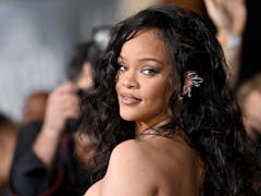 Sonically, Rihanna's "Lift Me Up" record imitates a church prayer and weepy lullaby.