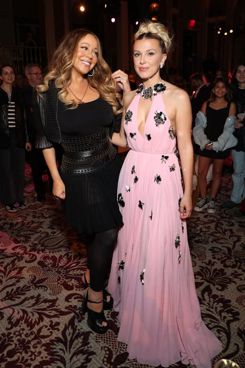 NEW YORK, NEW YORK - OCTOBER 27: Mariah Carey and Millie Bobby Brown attend the Netflix Enola Holmes...