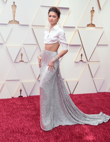 Wearing fall 2022 fashion trends for violet auras, Zendaya attends the 94th Annual Academy Awards at...