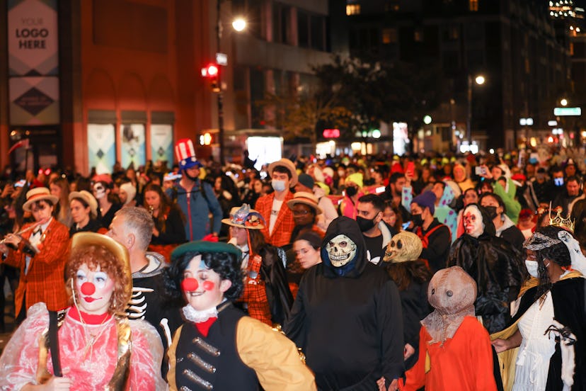 Revelers wearing different costumes attend the Halloween Parade in Lower Manhattan of New York in a ...
