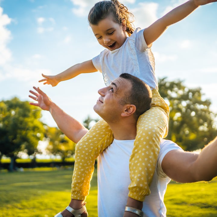 Cheerful young father and daughter in the park on sunny summer day. A fed up dad took to a Reddit to...