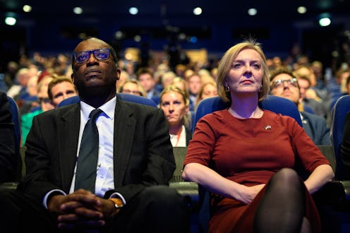 BIRMINGHAM, ENGLAND - OCTOBER 02: Chancellor of the Exchequer Kwasi Kwarteng (L) and Britain's Prime...