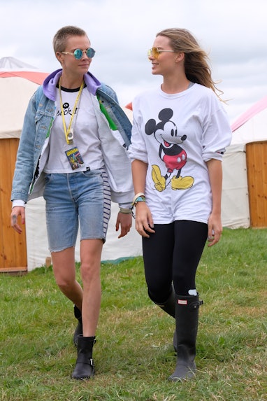 GLASTONBURY, ENGLAND - JUNE 24:  Cara Delevingne (L) and Margot Robbie attend day two of Glastonbury...
