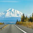 Mount Drum looms in the distance while traveling down the Glenn Highway, on this  Fall day in Interi...