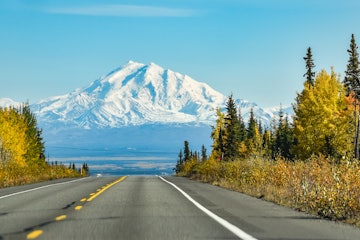 Mount Drum looms in the distance while traveling down the Glenn Highway, on this  Fall day in Interi...