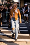 Wearing fall fashion trends for blue auras, Gigi Hadid attends the Vogue World fashion show during N...