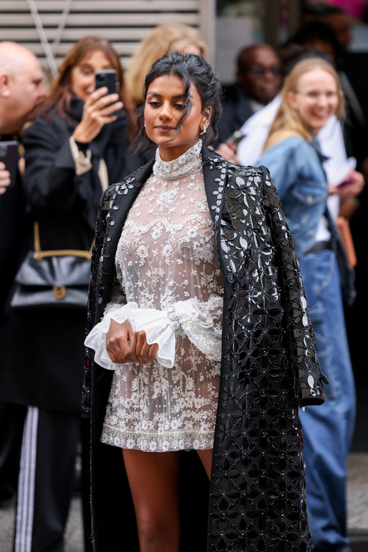 Wearing fall 2022 trends for pink auras, Simone Ashley attends the Paris Fashion Week - Womenswear S...