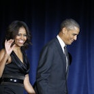 US President Barack Obama and First Lady Michelle Obama arrive for the "In Performance at the White ...