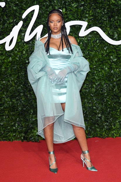 Rihanna's style evolution includes the outfit Rihanna wore when she arrived at The Fashion Awards 20...