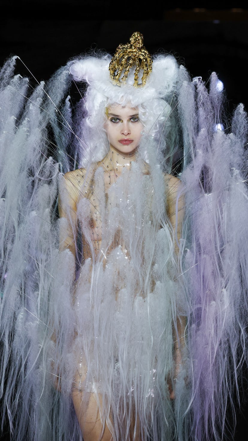 Weird Paris Fashion Week makeup includes the look seen on a model walking the runway during the Noir...