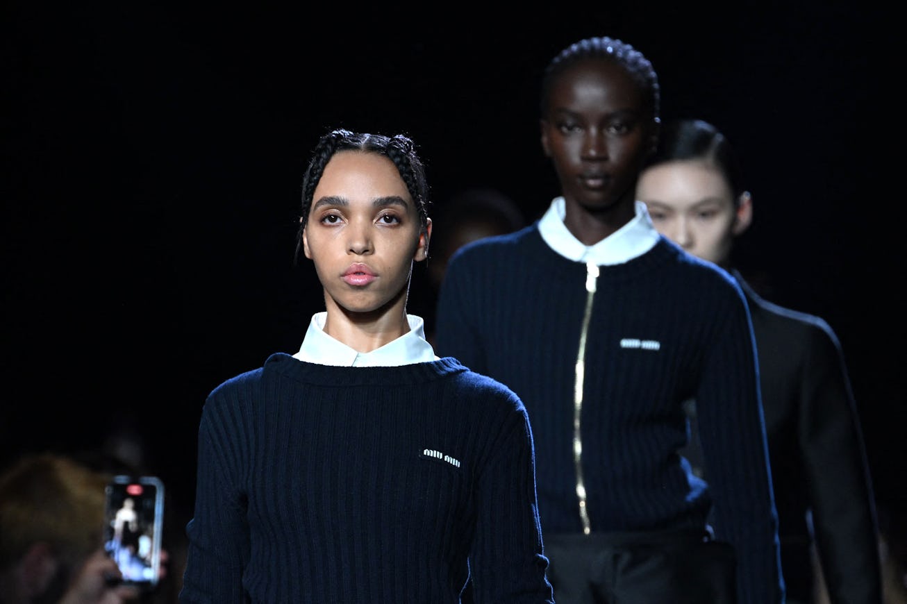 British musician Tahliah Debrett Barnett, known as FKA Twigs, presents a creation for Miu Miu during...