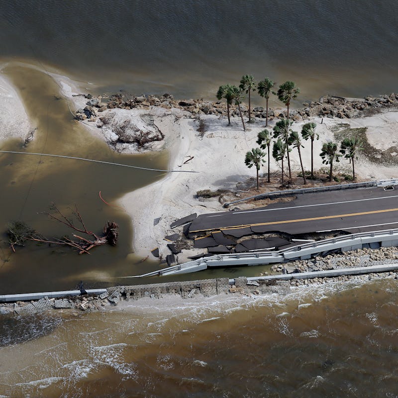 SANIBEL, FLORIDA - SEPTEMBER 29: In this aerial view, parts of Sanibel Causeway are washed away alon...