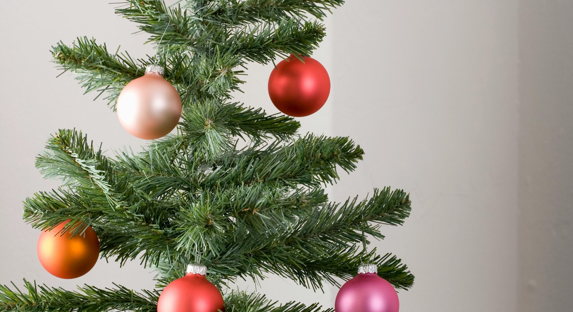 closeup of christmas tree with simple ornaments, christmas decorations you can already buy at costco