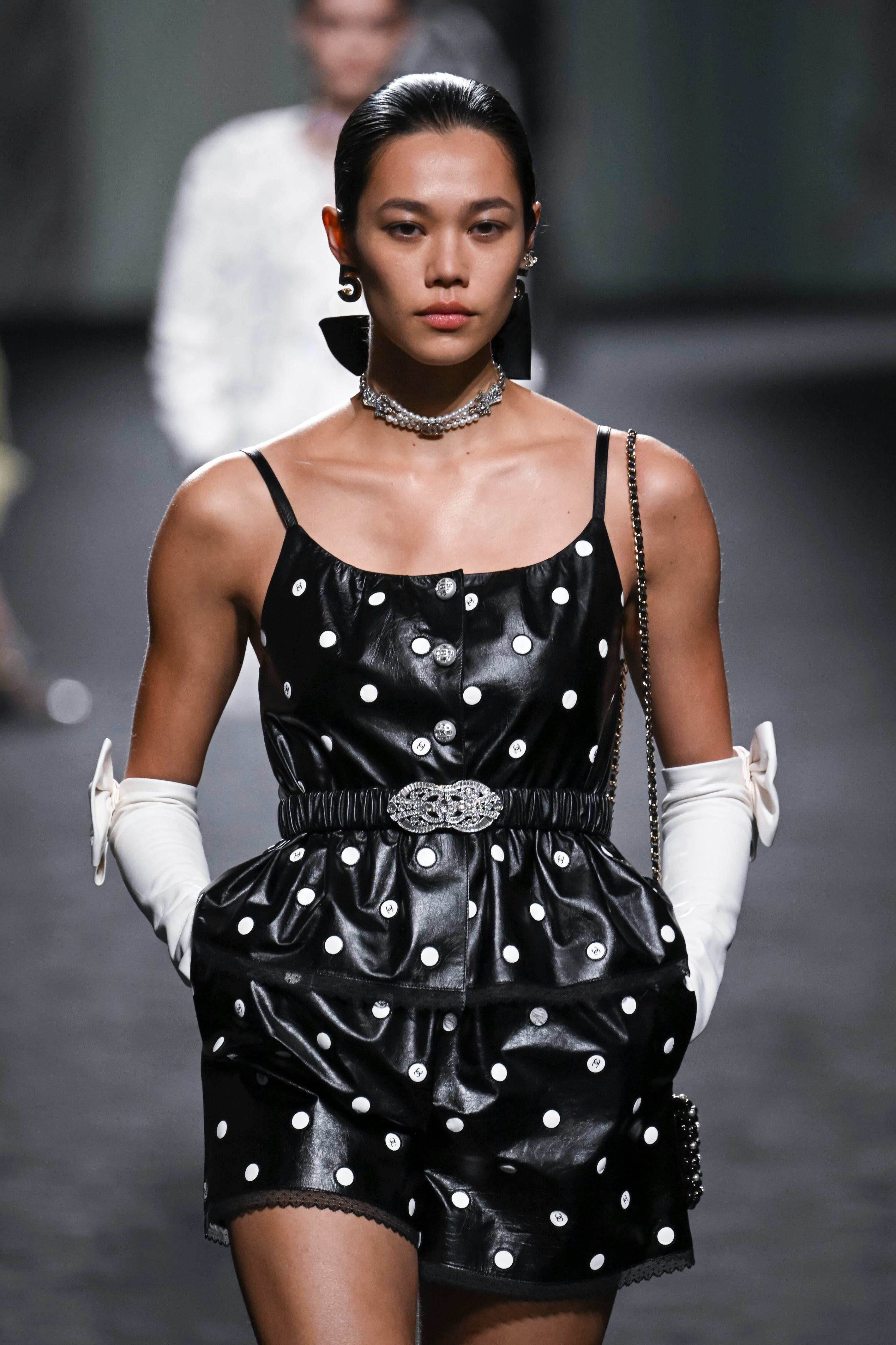 PARIS, FRANCE - OCTOBER 04: A model walks the runway during the Chanel Ready to Wear Spring/Summer 2...