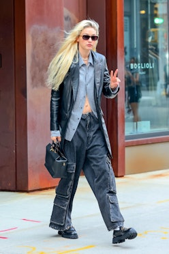 Gigi Hadid wearing black chunky Gucci leafers.