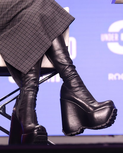 Hailey Bieber wearing huge platorm leather boots 