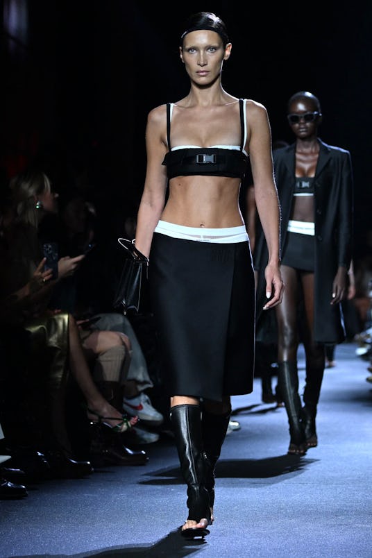 Bella Hadid presents a creation for Miu Miu during the Spring-Summer 2023 fashion show 