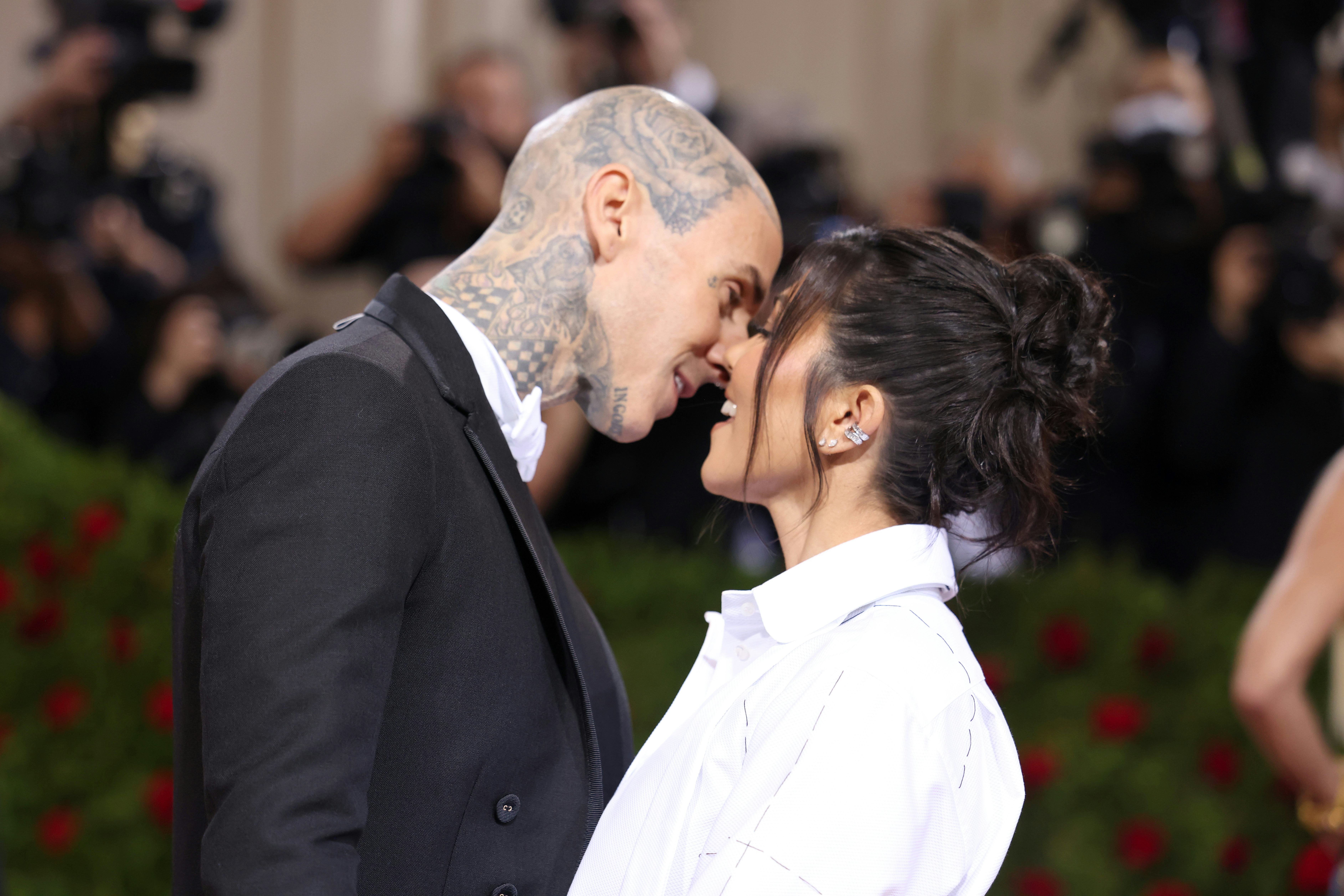 Travis Barker and Kourtney Kardashian kissing at the 2022 Met Gala celebrating &ldquo;In America: An Antho&hellip;