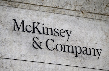 This photograph taken on April 12, 2022, shows a sign of US-based McKinsey & Company management cons...