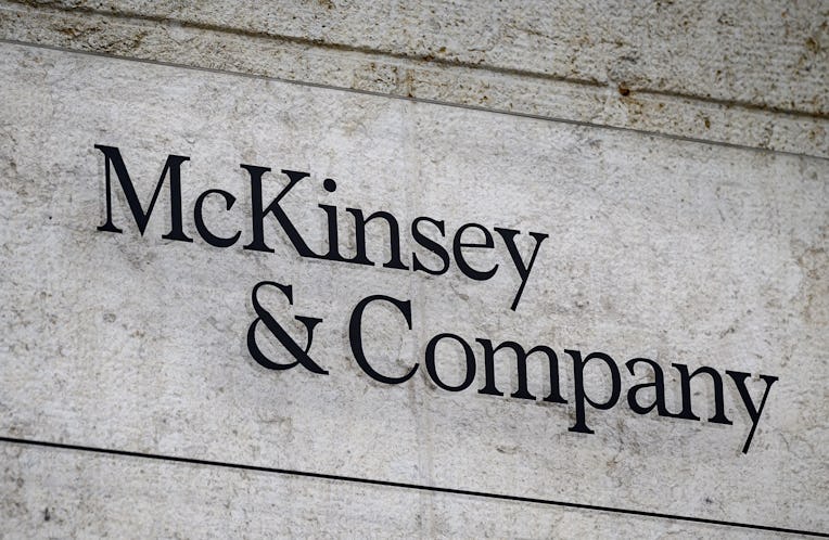 This photograph taken on April 12, 2022, shows a sign of US-based McKinsey & Company management cons...