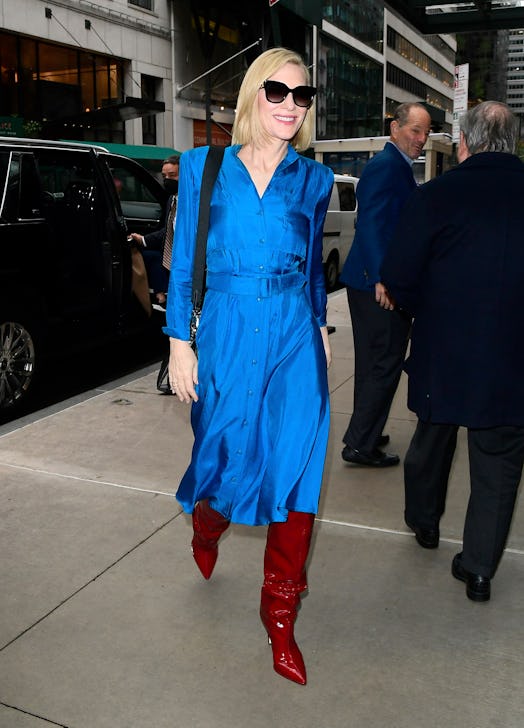 Cate Blanchett wearing Tamara Mellon's knee-high red patent boots.