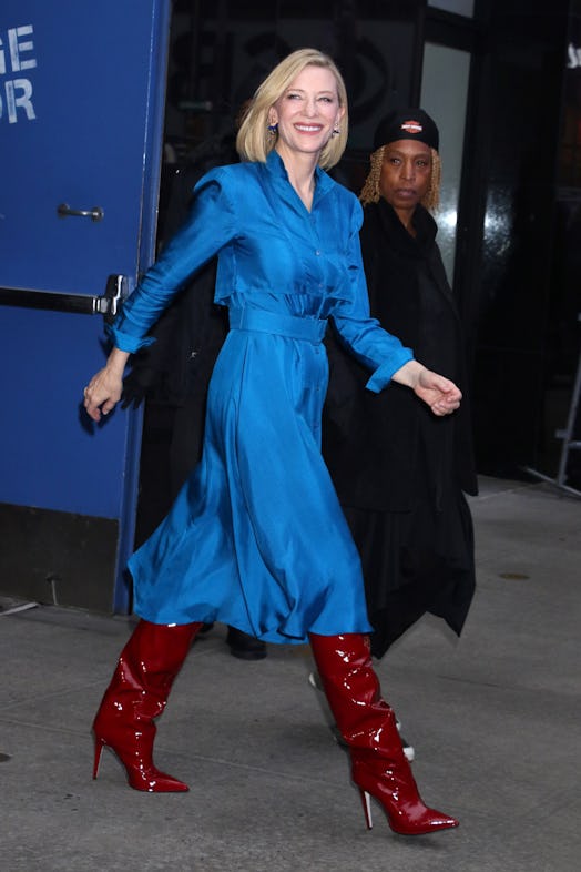 Cate Blanchett wearing Tamara Mellon's knee-high red patent boots.